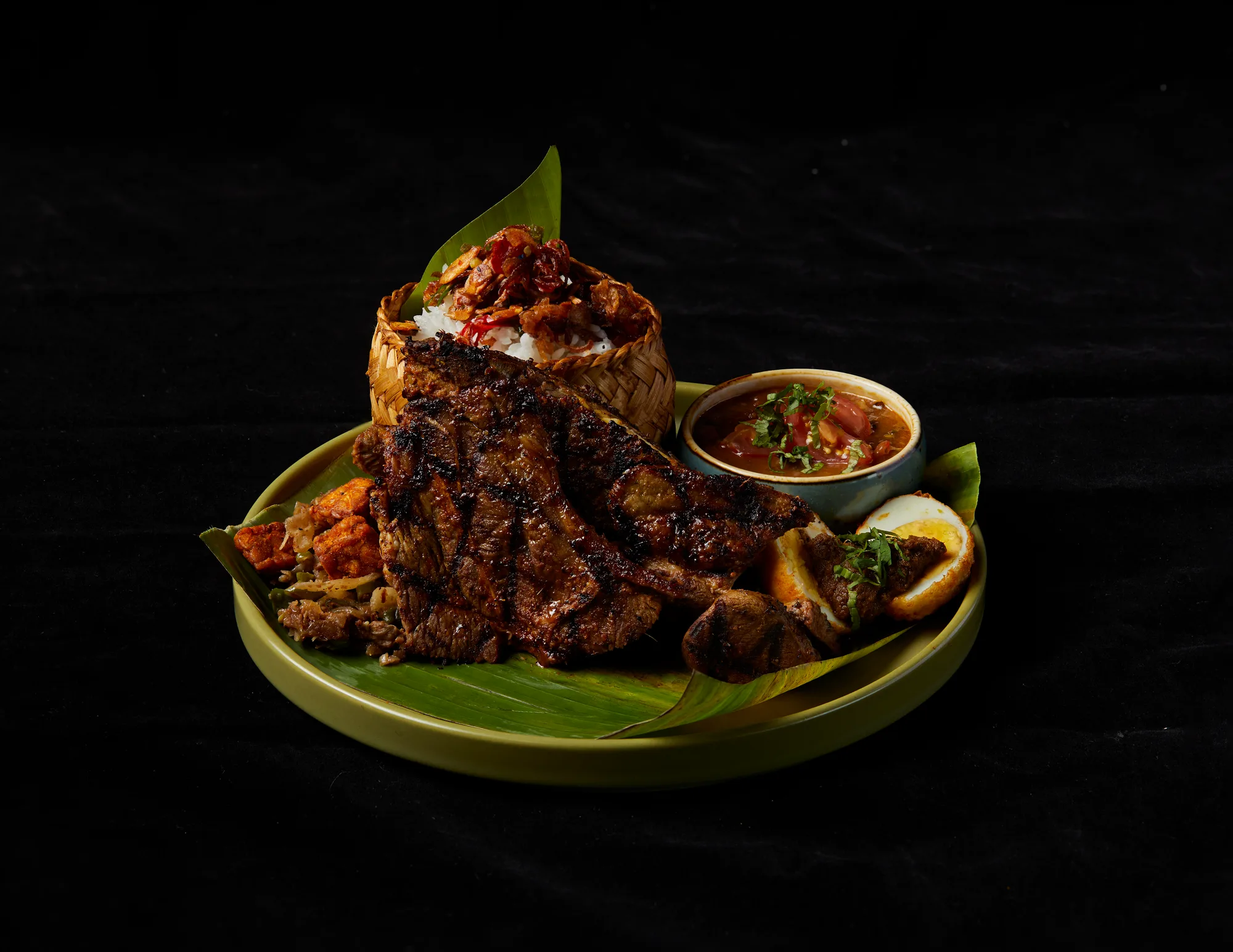 Signature Balinese platter served on banana leaf at Ole-Ole Bali Malaysia